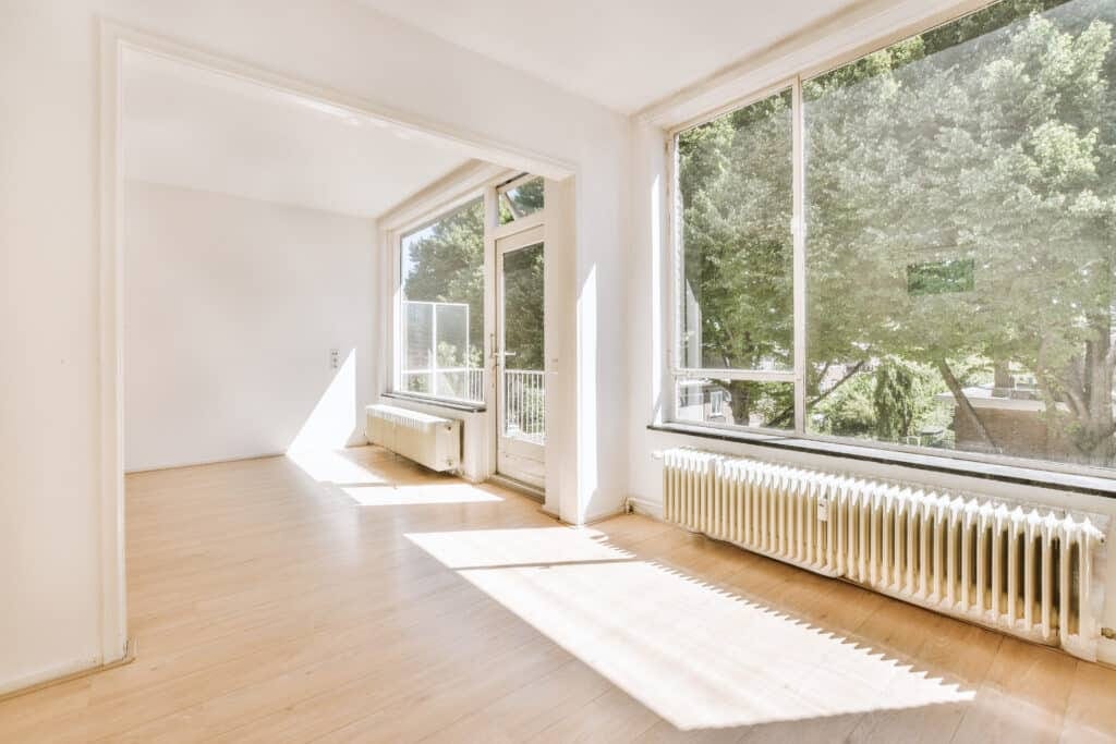 empty room with window and radiator 2023 11 27 05 21 24 utc