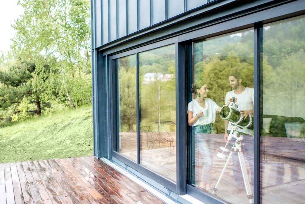 Maximise Your Indoor–Outdoor Flow: Choosing the Right uPVC Sliding or Stacking Door 1 couple with telescope at home 2025 03 18 15 14 53 utc