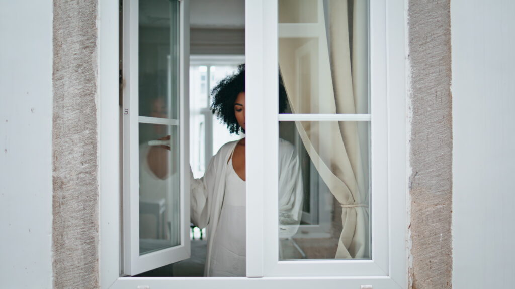 serene girl opening window morning black hair sil 2024 11 05 03 14 16 utc
