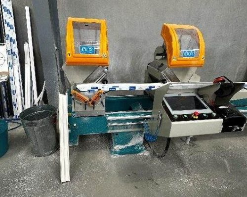 A machine is sitting in a room with other tools. A machine is sitting in a room with other tools.