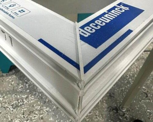 A picture of a white box with a label on it. A picture of a white box with a label on it.