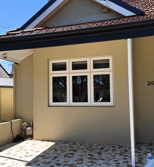 A house with a tiled floor and a door.